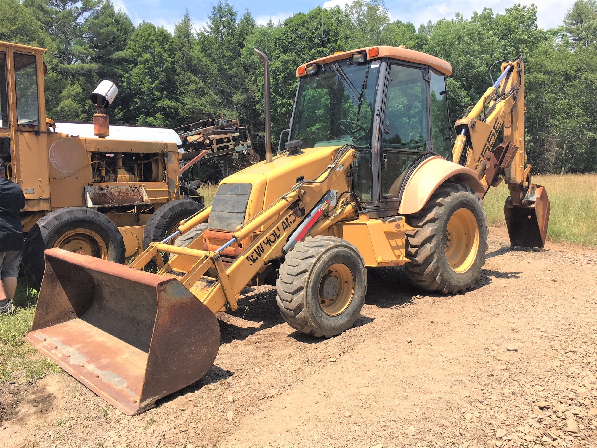 New Holland 4WD 555E Extendahoe backhoe 20'000 SOLD! United Exchange USA