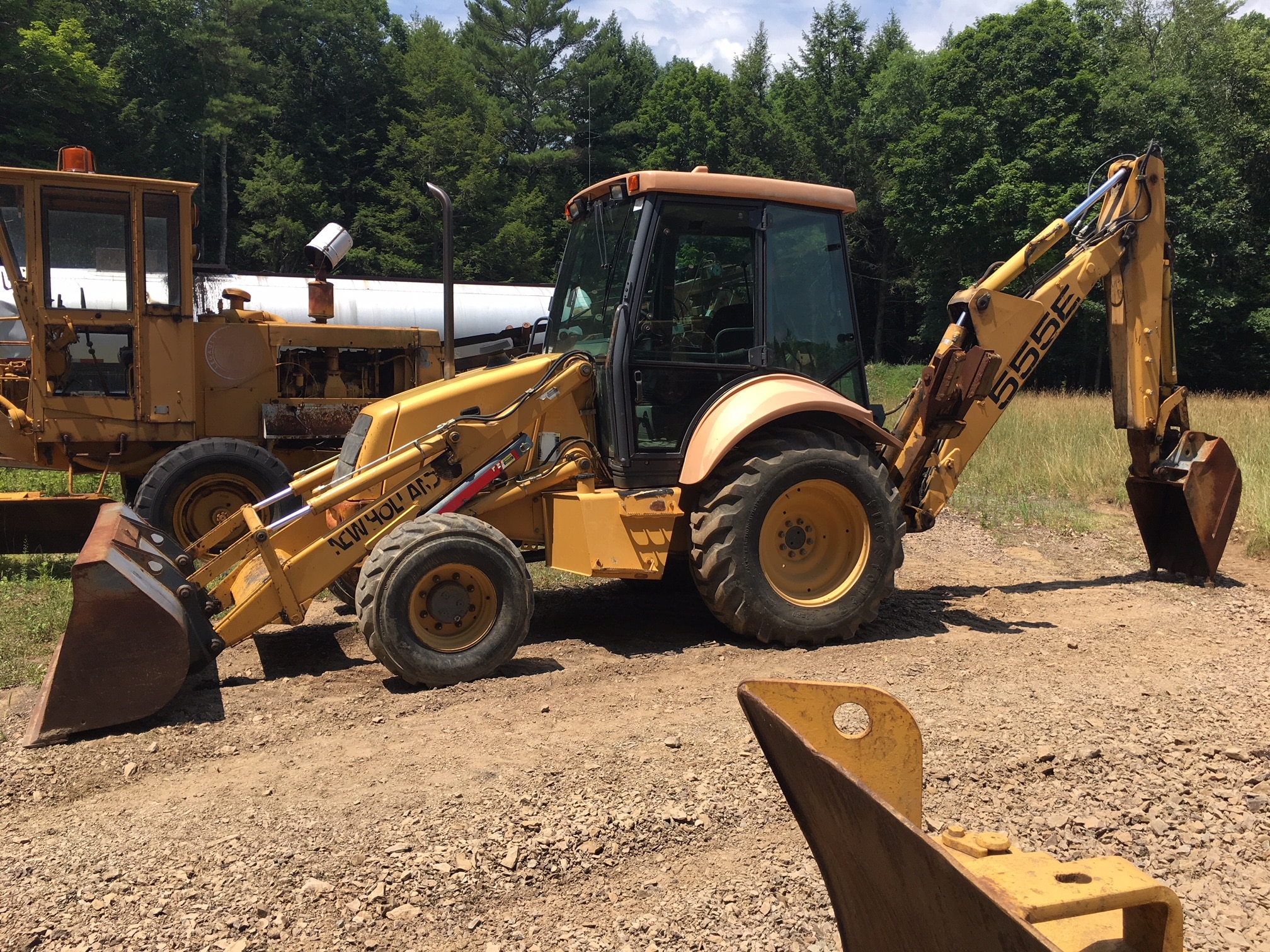 New Holland 4WD 555E Extendahoe backhoe 20'000 SOLD! United Exchange USA