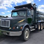 2000 Freightliner tri-axle dump truck with 434'975 miles. Has a Caterpillar C 112 diesel engine with 445 horse power and 2 stage Jake. A Eaton Fuller 8 speed low and low,low transmission. Has AC, cruse control, power and heated mirrors, power windows, newer batteries (under 2 years) trailer airlines and like new tires all around. Non steerable lifting axle. The dump box is 12 yards and has a dump box door with a barn door style operation option (swinging out) or can be used in the conventional style dump door operation. The truck has been recently serviced and inspected and is ready to work.