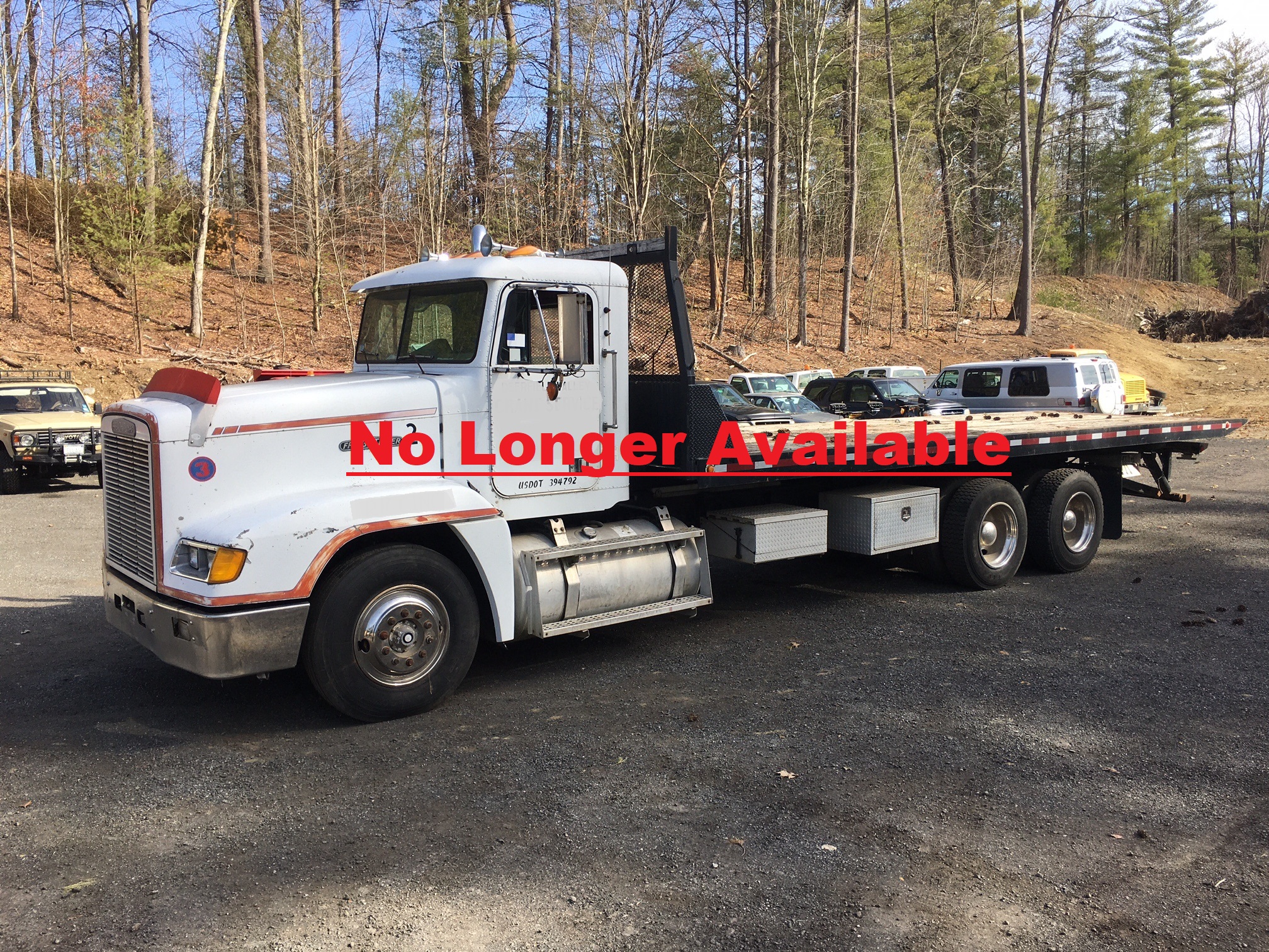 Freightliner Rollback Tow Truck. 1989 FLD 120 with a Caterpillar 14.6 liter six cylinder diesel motor with 704'116 miles. The transmission is an Eaton Fuller Road Ranger performance 9 speed with low. It has air ride suspension. The trucks fitted with a Jarr-Dan roll off flatbed and a Ramsey heavy duty winch. Measurements for the flatbed are 28 feet long by 8 feet wide and sits 4 feet 4 1/2 inches off the ground. The truck has AC, air ride driver seat, heated mirrors, engine break. The trucks GVWR is 40'000 lbs.