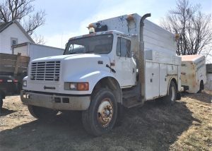 International 4700 Service Truck. 2005 T444E 4x2 with a 170" wheel base. The truck has an automatic transmission and 18'251 miles. The truck has a Honda EG 3500 generator and a Boss air compressor model 8060-UBI with 776 hours. It has air breaks, service air and air to the rear for towing. It has heat, AC and cruse control.