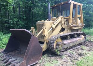 Caterpillar 977L Track Loader. Model year 1977 with a 6 cylinder 190 horsepower 3306 engine. Newer rollers, idelers, and track tension pistons repacked. Enclosed ROPS. Approximate 4 - 4.5 yard bucket. Weight 47'641 lbs.