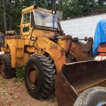 Michigan Clark Wheel Loader. 1975 tire wheel loader. Rebuilt 6 cylinder Cummins diesel engine. Three speed transmission. Repacked lift pistons. Operating weight approximately 23'708 lbs.