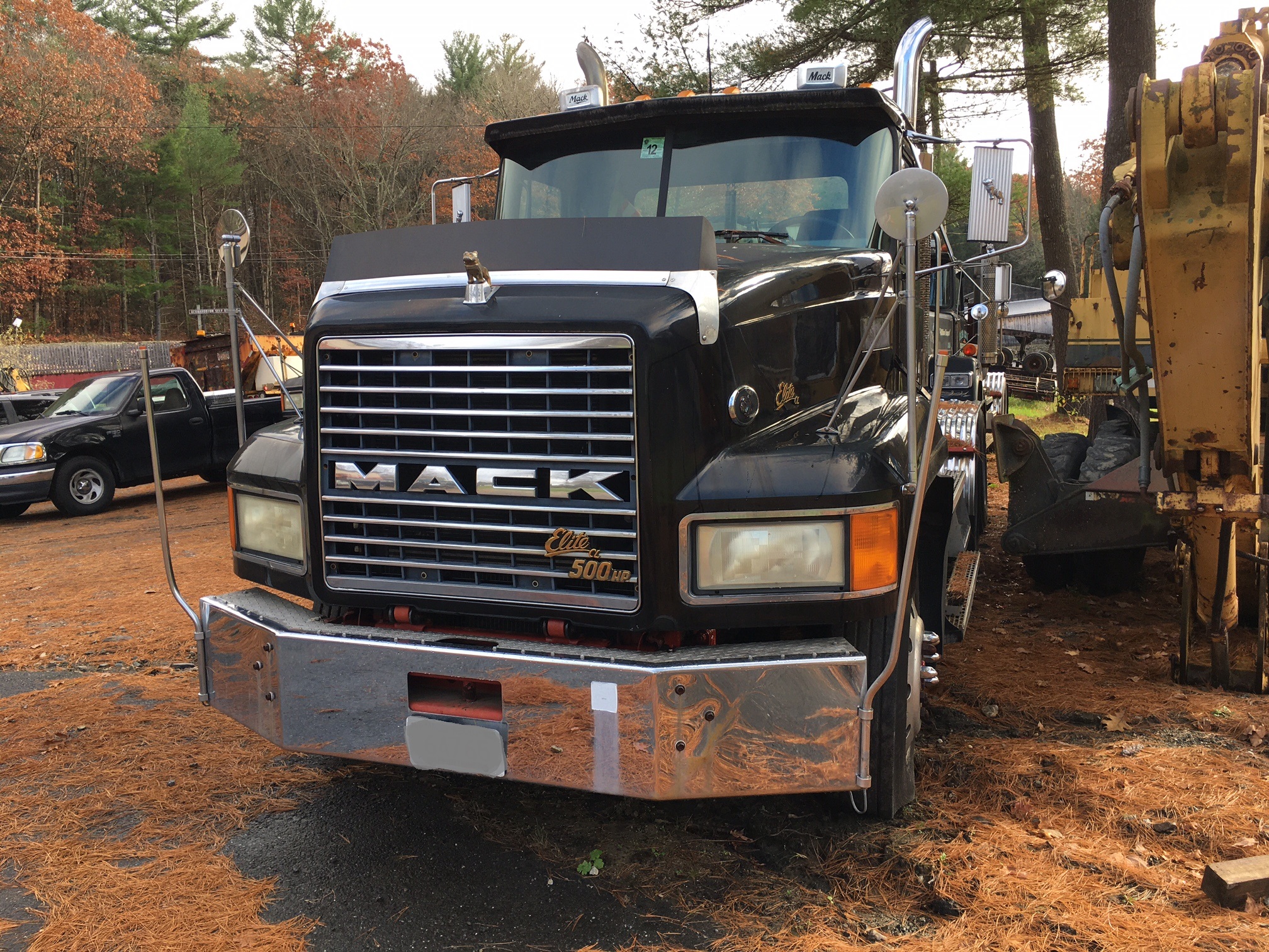 Used Mack truck for sale. Mack CL713 Semi Tractor. 1999 Mack 500 Elite with a 500 horsepower V8 diesel engine and 463015 miles. Maxitorque extended range 12 speed splitter transmission. 46k lbs. rears. Double frame. PTO and Wetline set up. Room for drop axle. Updated newer driver's cab. Engine break. Air ride drivers seat and A/C